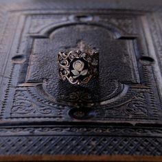 Victorian style filigree ring measuring 18mm wide at the widest point and fully adjustable.At its center is a 10x8 rose cameo. The ring band is available in antiqued brass and antiqued silver. The cameo is available in blue, black, pink and green.Each ring comes in a gift box. Virgo Gifts, Zodiac Rings, Claw Ring, Goth Jewelry, Cameo Ring, Dark Fairy, Jewelry Scarves, Wood Jewelry, Filigree Ring