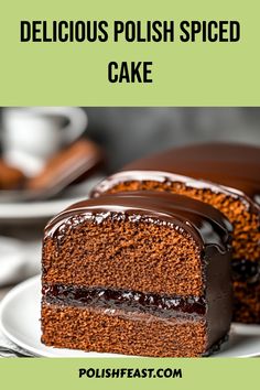 a slice of delicious polish spiced cake on a white plate with chocolate frosting