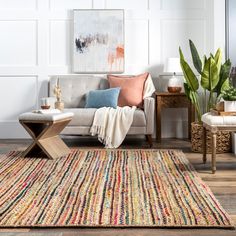 a living room filled with furniture and decor