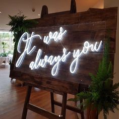 a sign that says thank always you on the side of a wooden easel in a room