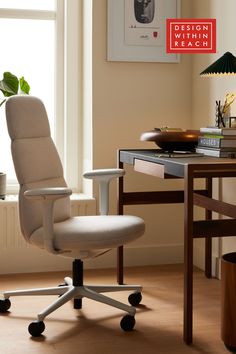 a white office chair sitting in front of a window next to a desk with a potted plant