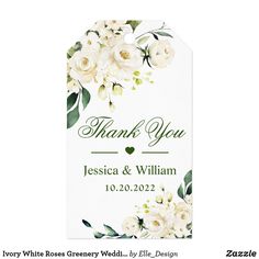 a thank card with white flowers and greenery