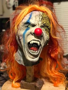 New from TonyBuckFX Studios is this custom made evil clown mask inspired by the new American horror story series Evil clowns and bees go hand in handmade from rd407 latex it's a half mask with a full wig so it wears like a full mask Can also be painted to suit PLEASE ALLOW UP TO 16 WEEKS TO SHIP AS THEY ARE HANDMADE TO ORDER Evil Clown Mask, American Horror Story Series, Fear Factory, Evil Clown, Clown Mask, Horror Masks, Hot Springs National Park, Send In The Clowns, Half Mask