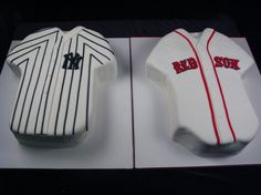 two cakes made to look like baseball shirts and pinstripes are on the table