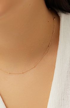 So minimal and made to last a lifetime, this dainty gold necklace is soon to be the start of your new favorite stack. Crafted from waterproof recycled solid gold, this simple gold necklace puts a luxe finishing touch on every look. 10k recycled solid gold Designed to last a lifetime Dainty silhouette Length: 406mm - 16", 51mm - 2" Weight: 1g Chain Width:1.8mm - 0.07" Spring Ring Clasp Crafted In China Satellite Necklace, Simple Gold Necklace, Plain Jewelry, Gold Necklace Wedding, Gold Minimalist Jewelry, Simple Choker, Dainty Chain Necklace, Solid Gold Charms, Gold Necklace Simple