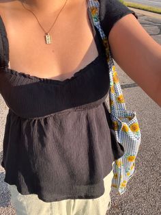 babydoll top, outfit, clothes, fit, fit inspo, black top, green pants, summer, tote, tote bag, necklace, hollister, flared, flare pants, sage green, sun, pic inspo, outfit inspo Styling Cami Tops, Cute Babydoll Tops, Babydoll Top Outfit Summer, Babydoll Cami Top, Babydoll Tops, Europe Outfits, Warm Weather Outfits, Spring Fits, Summer Fits