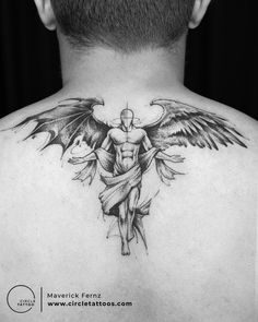 the back of a man's neck with an angel and cross tattoo on it