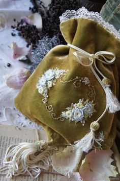 a bag with flowers and lace on it