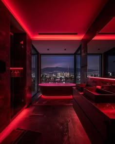 a large bathroom with red lighting on the ceiling and tub in the middle of it