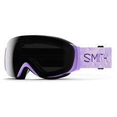 a pair of ski goggles sitting on top of a white surface with purple straps