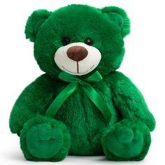 a green teddy bear with a bow on it's head and eyes, sitting in front of a white background