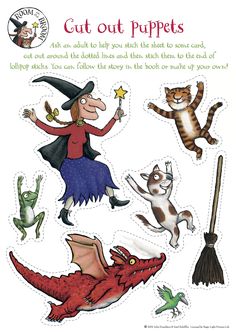 an image of cut out puppets with cats and dogs on them, including a witch