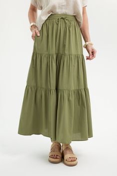 bamboo Relaxed Tiered Maxi Skirt For Vacation, Tiered Maxi Skirt For Vacation With Relaxed Fit, Relaxed Tiered Maxi Skirt With Elastic Waistband, Casual Tiered Maxi Skirt With Layered Hem, Casual Flowy Maxi Skirt With Layered Hem, Flowy Spring Maxi Skirt, Casual Relaxed Maxi Skirt With Layered Hem, Flowy Long Skirt With Layered Hem, Voluminous Tiered Skirt For Beach