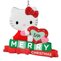 a christmas ornament with a hello kitty holding a heart and name on it