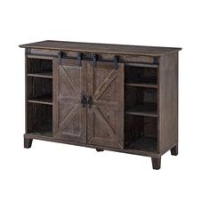 an old wooden cabinet with sliding doors