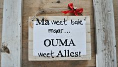 a sign that says ma weet bae mar ouma wet alles