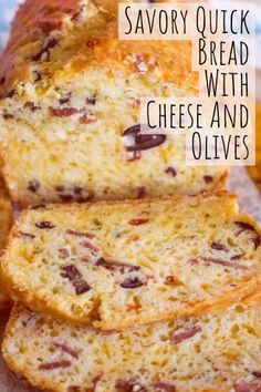 sliced loaf of bread with cheese and olives on the side, text reads savory quick bread with cheese and olives