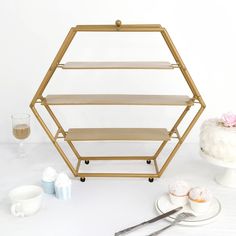 PRICES MAY VARY. [Information] Hexagonal Metal Cake Stand Combining the contemporary charm of hexagonal shape with glossy metallic luster, this eccentric Cake Stand will take your cake or dessert table decoration up by several notches. Add a clean and dynamic presentation to any table top with this 3 Tier cupcake stand that makes a beautiful addition to weddings, birthdays, showers, catered events, and festive events. 3-Tier Display Stand Featuring modern tiered design and eye-catching hexagon s Hexagon Cake Stand, Tiered Cupcake Stand, Gold Cupcake Stand, 3 Tier Cupcake Stand, Appetizer Display, Tiered Dessert Stand, Cupcake Holders, Tiered Cake Stands, Dessert Holder