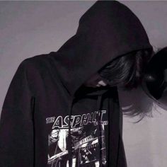 a person wearing a black hoodie with the words asphant on it