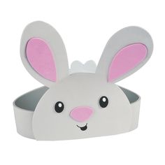 a white rabbit shaped box with pink ears