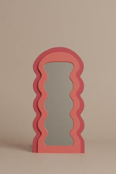 an image of a mirror that is in the shape of a shell