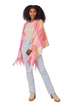 The Scarf Wrap is a cozy and stylish accessory that is perfect for those chilly days. Made from a fuzzy plaid material, this wrap is not only soft to the touch but also adds a touch of sophistication to any outfit. It features cut-out arm holes, allowing for easy movement and versatility. The tassel trim adds a playful and trendy element to the wrap, making it a fashionable choice for any occasion. Crafted from fleece, this scarf wrap provides warmth and comfort, keeping you snug and cozy all da Bright Scarf, Abstract Scarf, Brown Scarves, Leopard Scarf, Pink Scarf, Pink Scarves, Mud Pie, Getting Cozy, Pink Brown