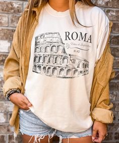 Embrace the culture of Ancient Rome with this Roma Colosseum tshirt. Wonderful gift tee for girls trip or family vacation to Italy. The Comfort Colors C1717 100% Ring Spun Cotton T-Shirt is very appropriately-named. All colors are inspired by nature and have a perfect lived-in, weathered look. Shirts are sent through a unique dyeing process that makes them incredibly soft and long-lasting. Each piece is soft-washed 50 times before making its way to you! Stitched at the collar, armhole, sleeves a Vacation To Italy, Rome Colosseum, Perfect Live, Rome Antique, Dyeing Process, Ancient Rome, Life Design, Dyed Fabric, Favorite Shirts