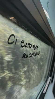 there is a sign on the side of a bus window that says, c sano regio new direction