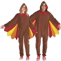 two people in turkey costumes standing next to each other