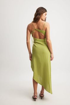 Linen Blend Asymmetric Open Back Midi Dress Green | NA-KD Green Midi Dress With Adjustable Straps, Green Backless Dress With Tie Straps, Green Midi Dress With Spaghetti Straps And Tie Back, Chic Green Linen Beach Dress, Spring Green Midi Dress With Adjustable Straps, Green Midi Dress With Adjustable Straps For Spring, Chic Green Maxi Dress With Adjustable Straps, Green Midi Dress With Adjustable Straps For Beach, Summer Brunch Midi Dress With Asymmetrical Neckline