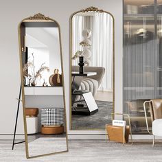 a large mirror sitting on top of a floor next to a chair