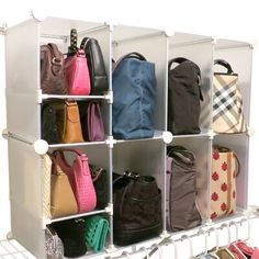 a rack with purses and handbags hanging on it's sides in front of a white background