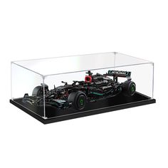 a car in a glass case on a white background