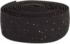 a roll of black yoga mat with white speckles on it, sitting in front of a white background