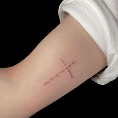 a woman's arm with a tattoo that reads, the cross is not always there