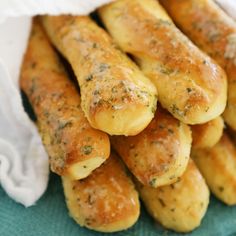 some very tasty looking bread sticks on a plate