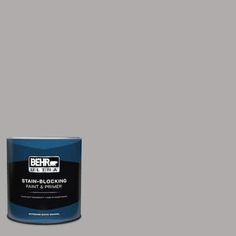 a can of behr paint on a gray background with the words stain - blocking