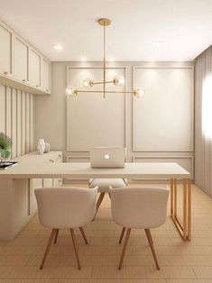 a laptop computer sitting on top of a white table in a room with wooden floors