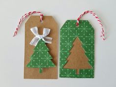 two tags with christmas trees on them