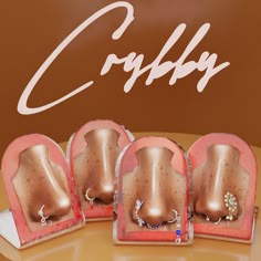 four different types of jewelry on display with the word coffyx written above them