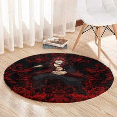 a red and black area rug with an anime character on it