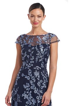 Stunning floral embroidery blossoms on the mesh overlay of a classic A-line dress that's ideal for your next special occasion. 54" length Hidden back-zip closure Bateau neck Cap sleeves Lined, except sleeves 100% polyester Dry clean Imported Mesh Cocktail Dress, Tea Length Dress, Mother Of The Bride Dresses Long, Mother Of Groom Dresses, Work Dresses, Bateau Neck, Tea Length Dresses, Mesh Overlay, Dress 16