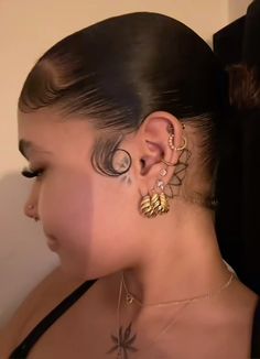 a woman with ear piercings on her ears