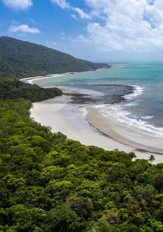 an aerial view of the beach and ocean