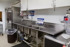 the kitchen is clean and ready to be used as a restaurant or office space for employees