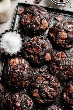 chocolate muffins on a cooling rack with sea salt