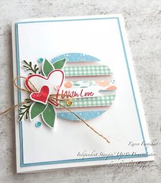 a close up of a greeting card with a heart on the front and an arrow on the back