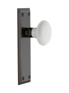 an image of a white light on the side of a wall mounted fixture with black trim