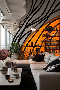 a living room filled with lots of furniture next to a tall window covered in black and white stripes