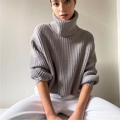 Aritzia Babaton Guell Ribbed Wool Turtleneck Sweater Opal Grey Size Small Excellent Condition. Life-Changing Sweater In Italian Merino Wool. This Is A Relaxed-Fitting Turtleneck With Dropped Shoulders And Ribbed Trim. It's Knit With 100% Merino Wool - Luxe, Extra-Fine Yarn Beloved For Its Natural Warmth And Soft, Lightweight Feel. We Source Ours From A Premier Italian Mill. Features Fold-Over Collar Ribbed Finish At Neckline And Hem Materials & Care Origin: Fabric From Italy Content: 100% Merino Elegant Gray Winter Tops, Elegant Gray Winter Top, Elegant Gray Turtleneck Sweater, Elegant Silver Winter Top, Elegant Silver Tops For Winter, Wool Turtleneck Sweater, Funnel Neck Sweater, Easy Shape, Fitted Turtleneck